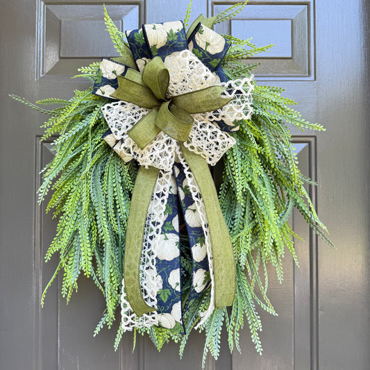Elegant Greenery Wreath with Designer Bow – 22” x 24” x 7”