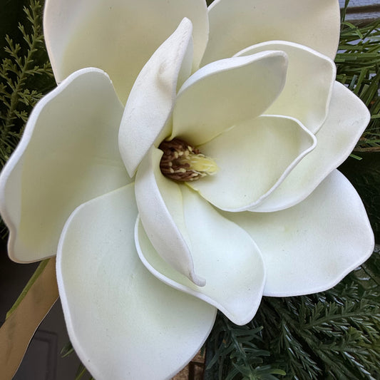     Luxury year-round magnolia front door wreath handmade in North Carolina. Close up image of real touch magnolia flower.
